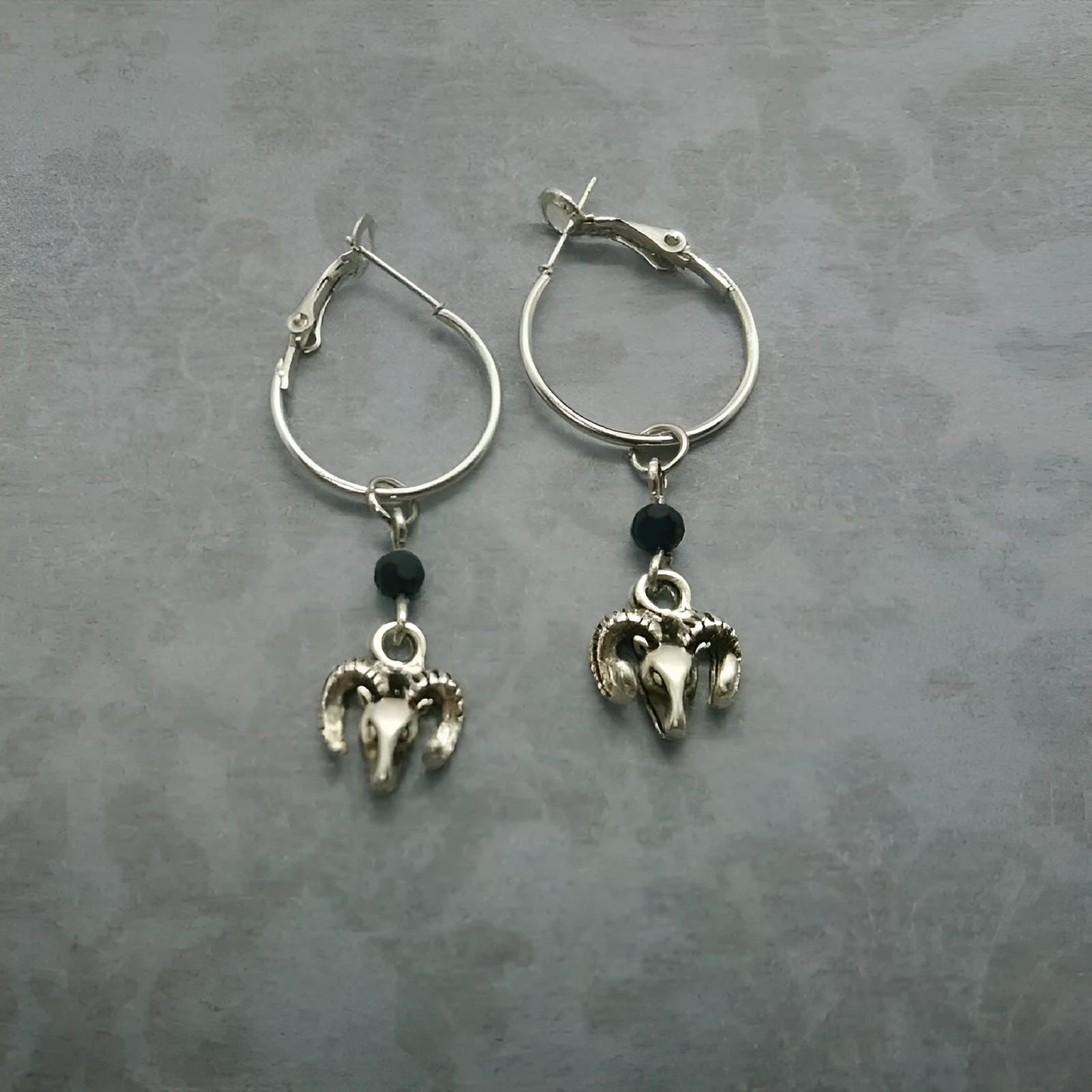 Silver alloy round ring earrings with Tibetan antelope design for women