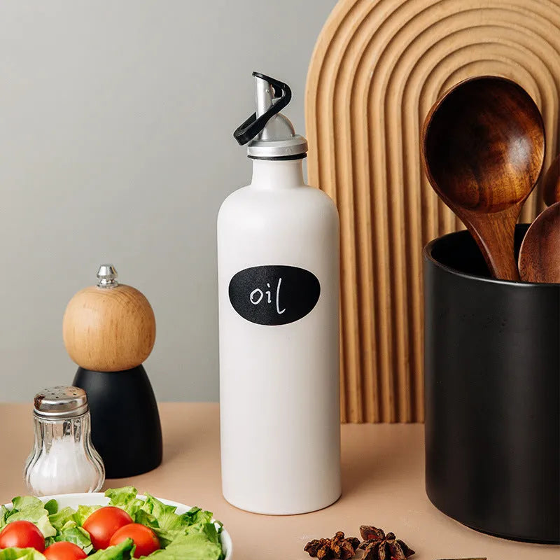 Ceramic oil pot with brush and funnel in black, coffee, or white colour, 650ml capacity.