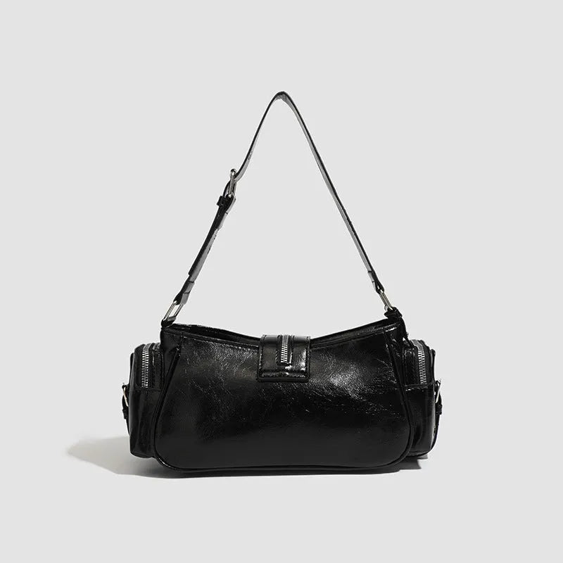 Black retro dumpling-shaped shoulder bag with three-dimensional pockets and oil wax leather finish