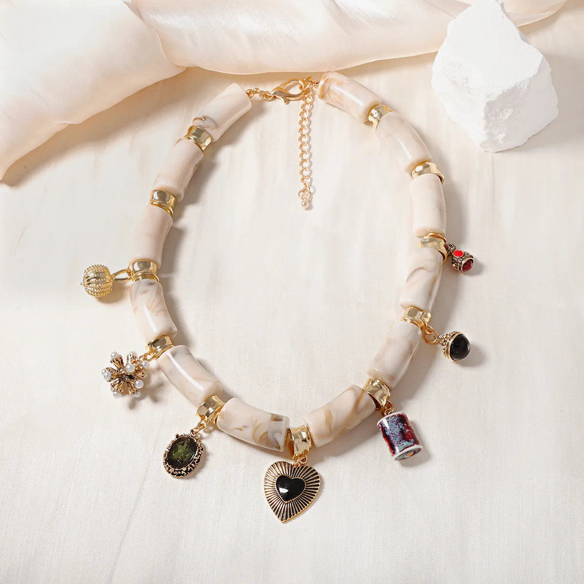 Heart shaped resin and bamboo pendant necklace with electroplated finish for women