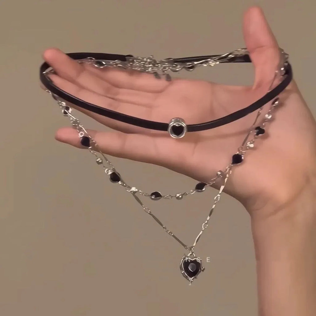 Women's multi-layer necklace set with leather heart designs and adjustable clavicle chain