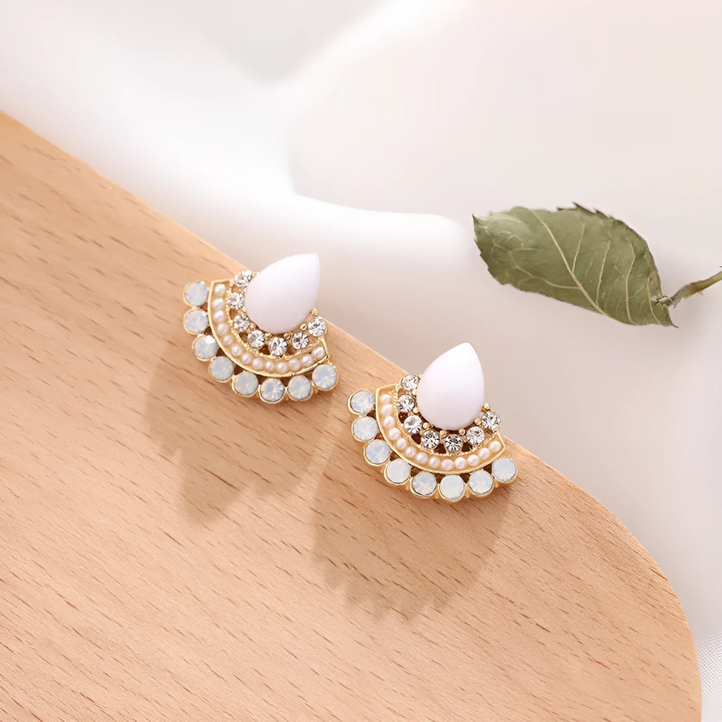 Retro silver fan-shaped earrings with needle opal and rhinestone geometric design