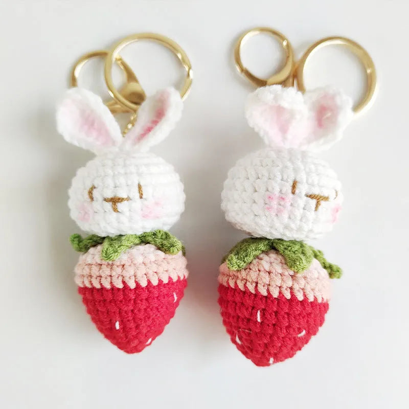 White hand-woven rabbit strawberry pendant on keychain made from doll wire