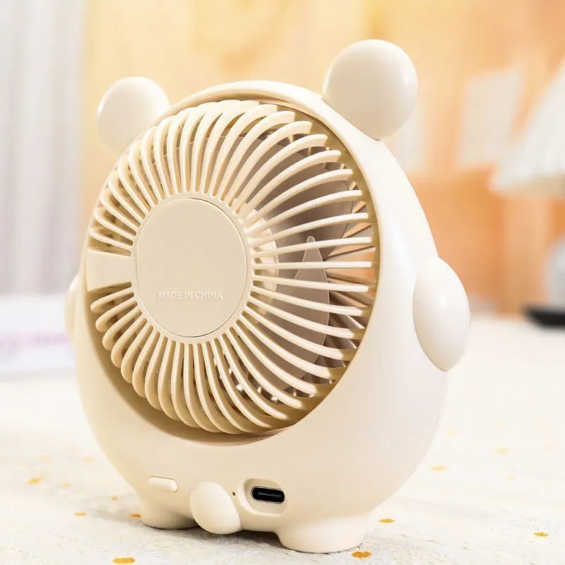 USB desktop electric fan with cute dog design in various colour options showing three-speed controls