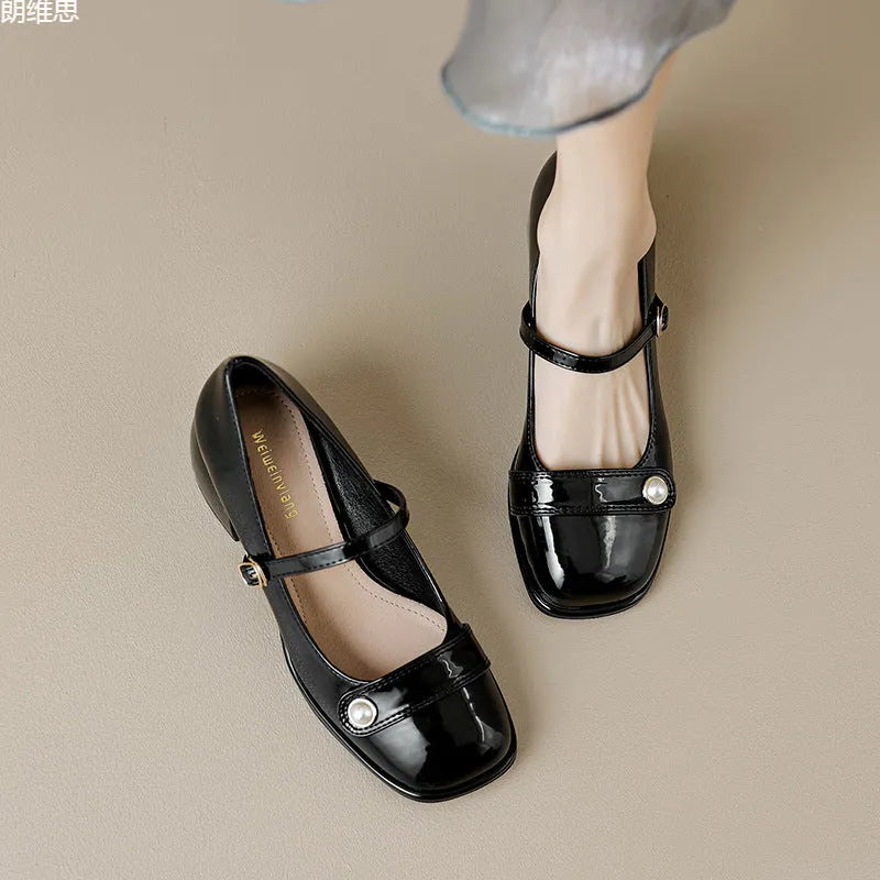 Women's patent leather chunky heel pumps with buckle closure and square toe