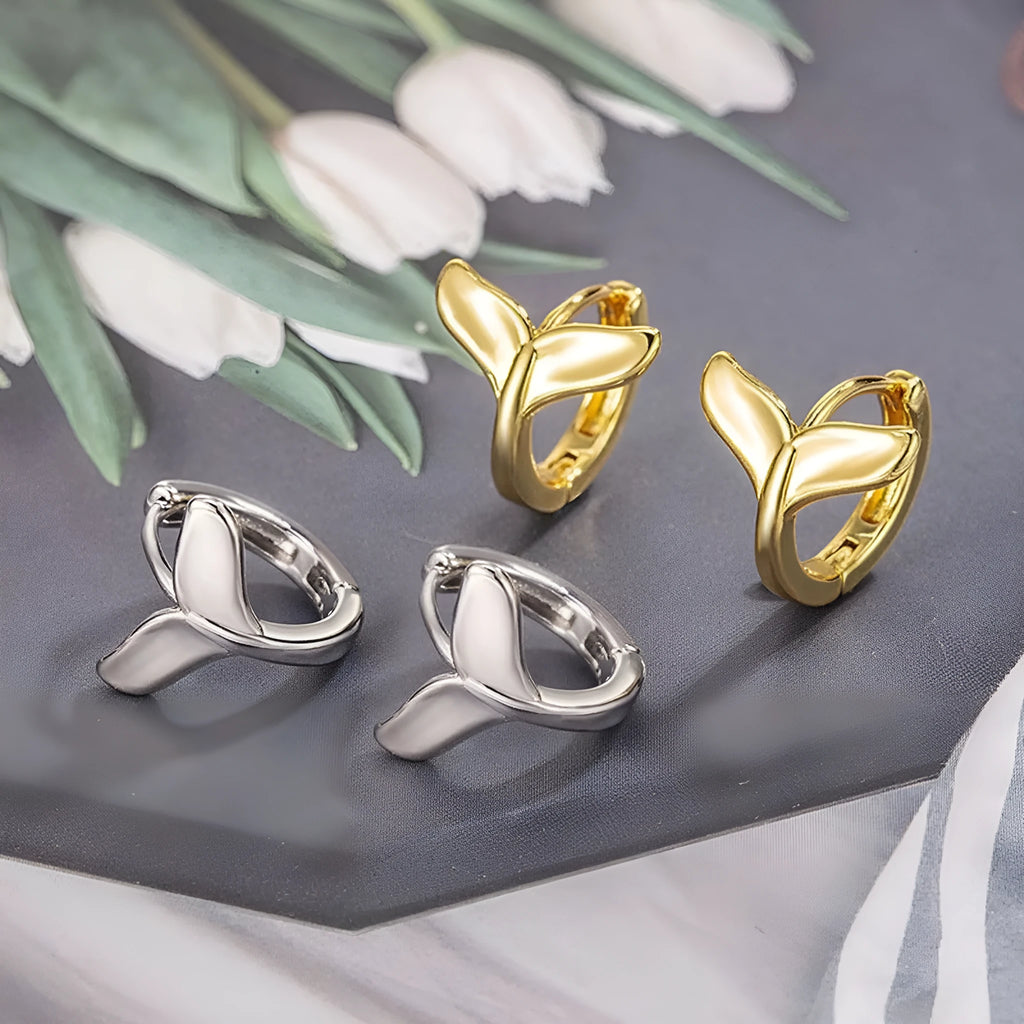 Women's fishtail design earrings in electroplated white gold or yellow gold colour on copper material