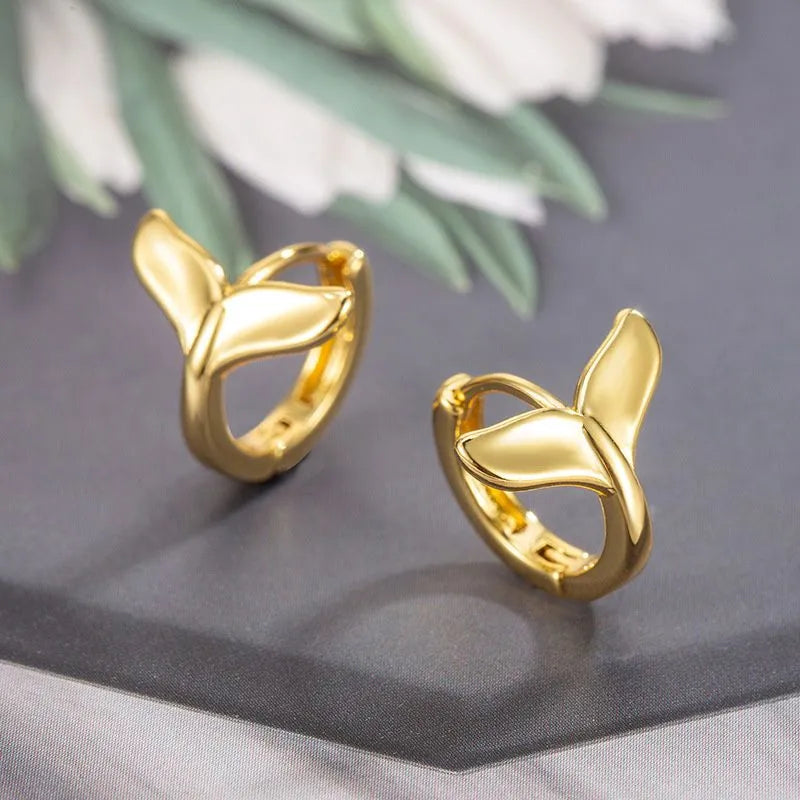Women's fishtail design earrings in electroplated white gold or yellow gold colour on copper material