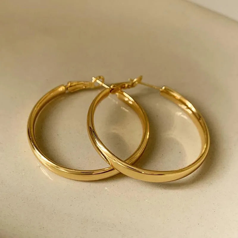 40mm circular copper earrings with electroplated gold or silver finish