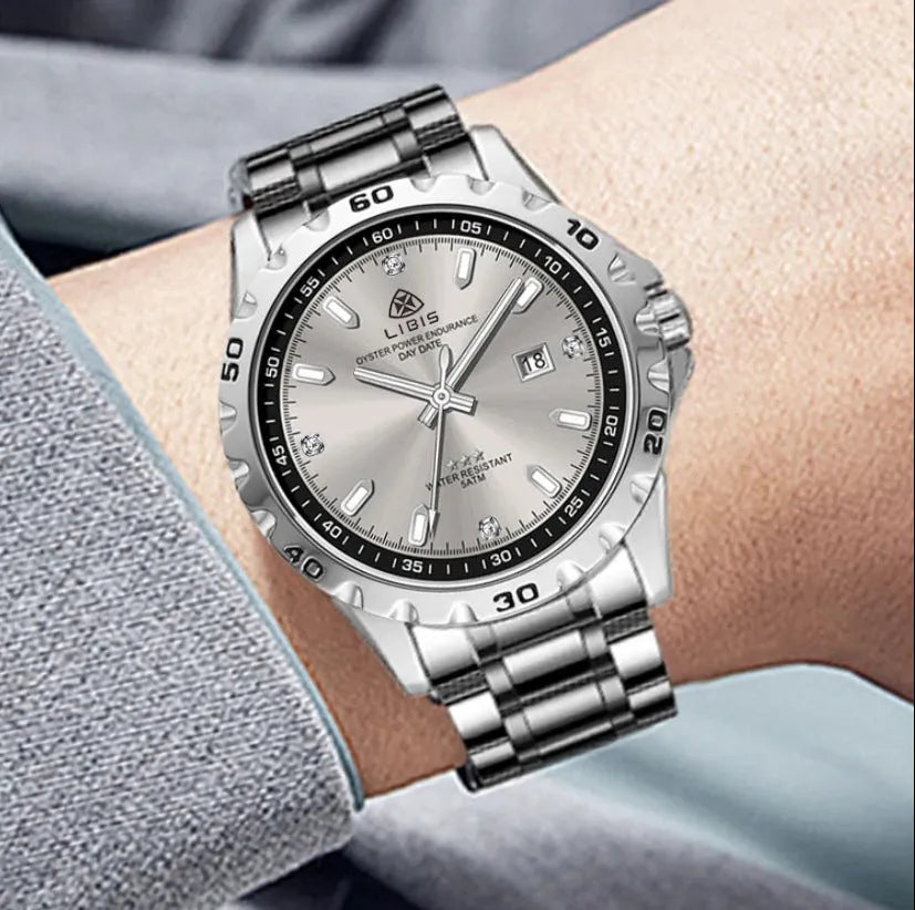 Men's silver business watch with stainless steel strap, luminous hands, and sapphire crystal glass face