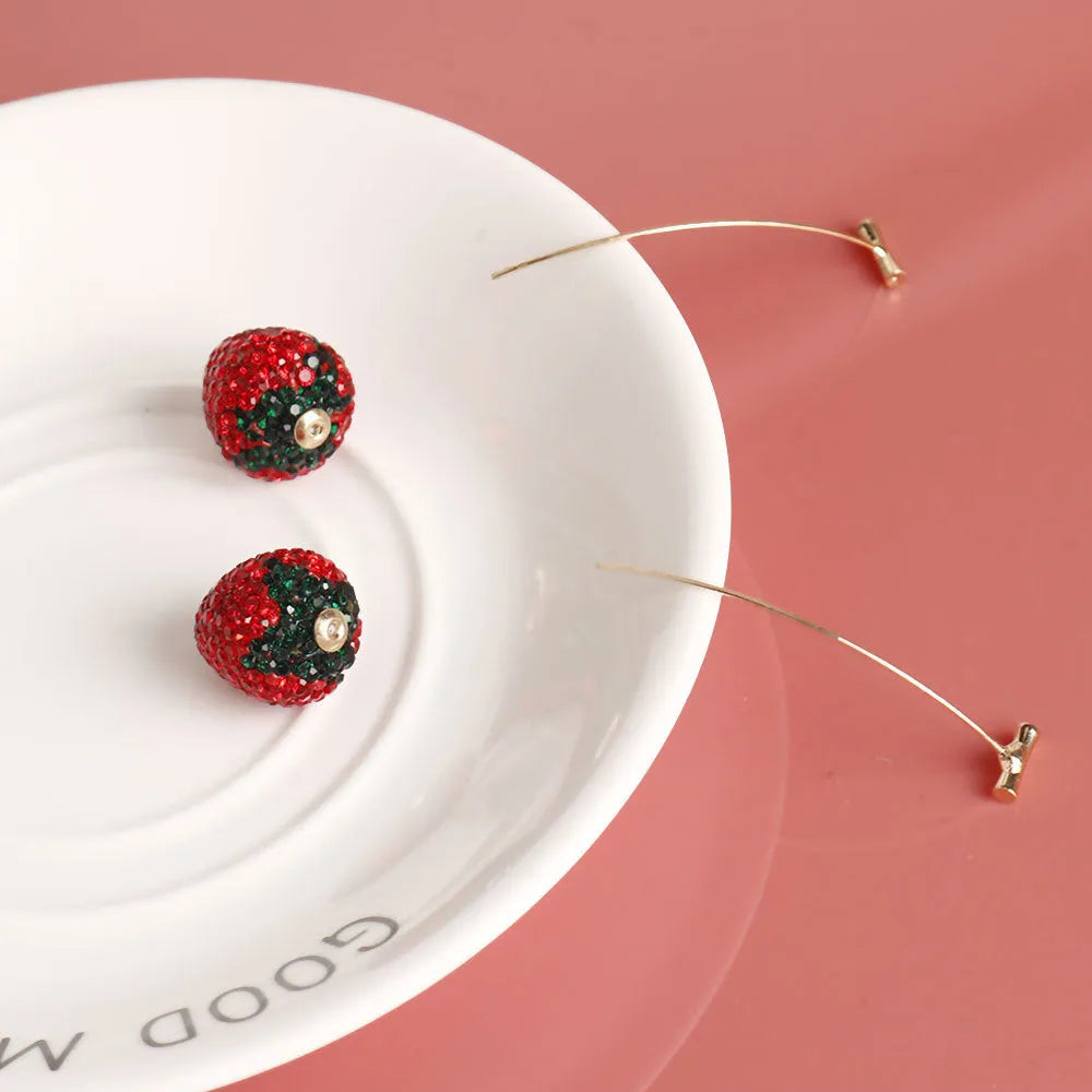 Geometric strawberry stud earrings with spot drill detailing in six colour variations