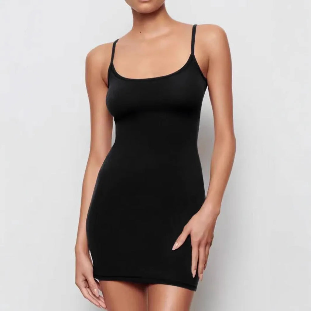Black sling sheath dress with sleeveless design and mid-waist silhouette