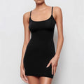 Black sling sheath dress with sleeveless design and mid-waist silhouette