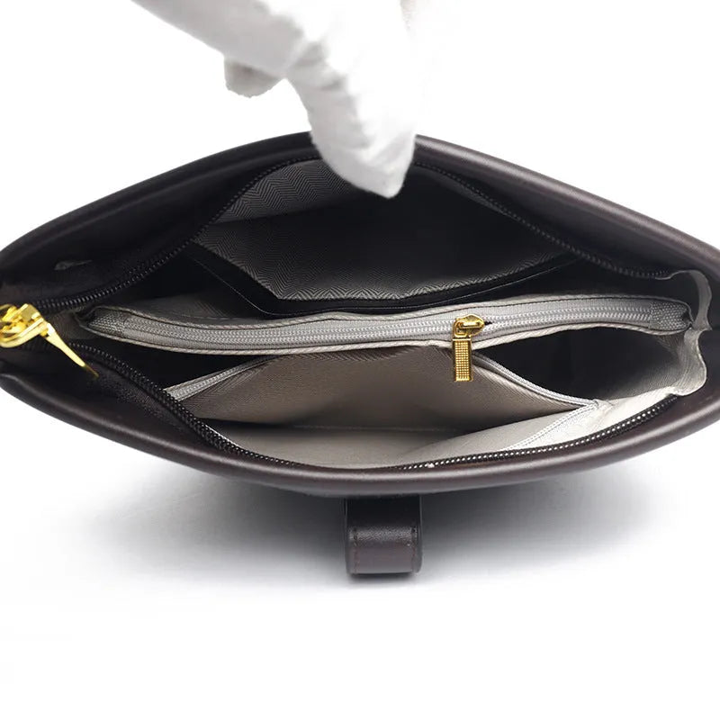 Korean style soft PU leather bucket bag with double shoulder straps in black colour showing internal organisation compartments
