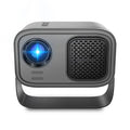 Black portable HD projector with Android interface and remote control on desk