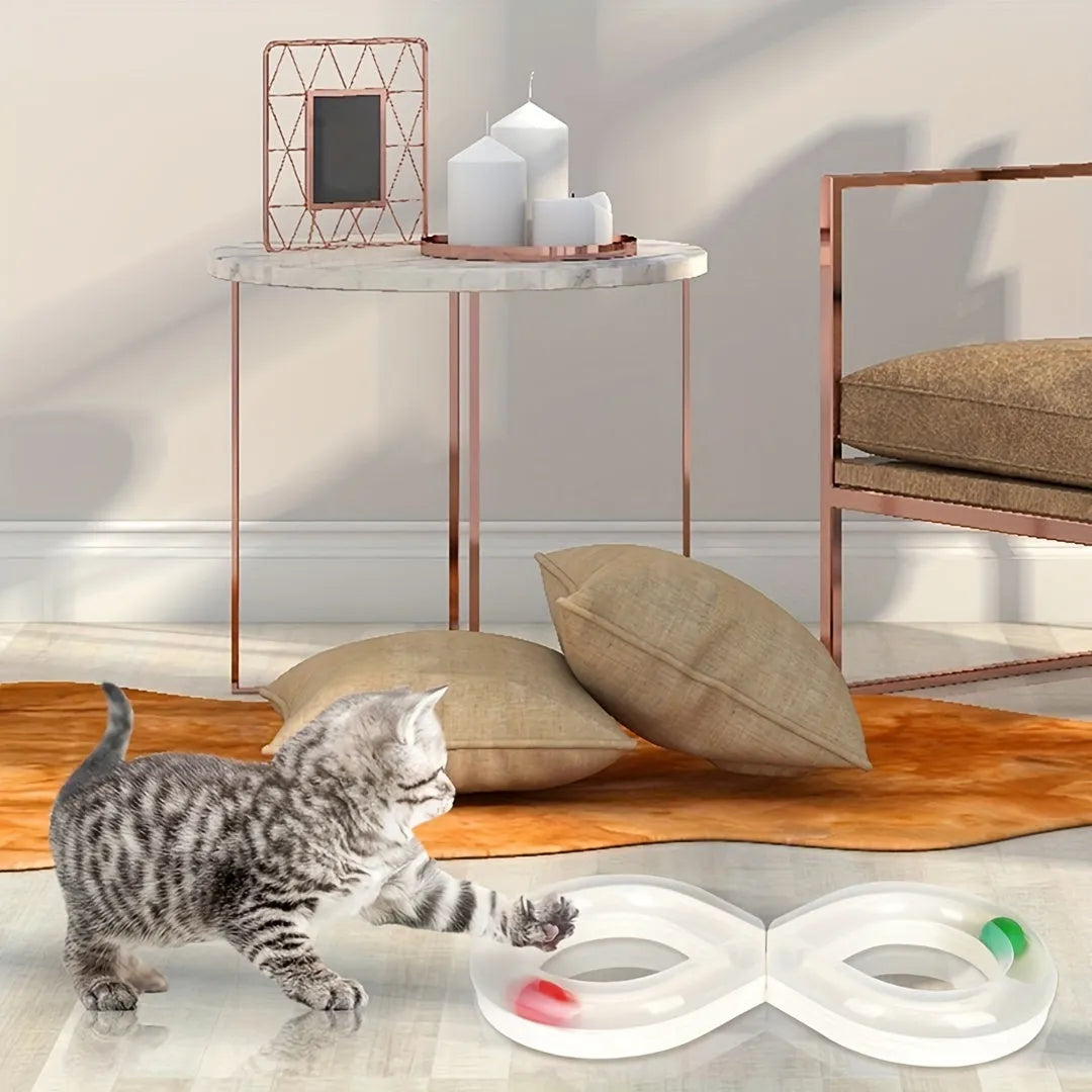 Blue and white cat turntable toy set with track balls and a feather teaser stick on a plain background.