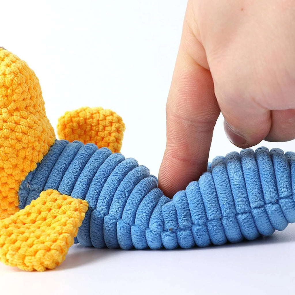 Squeaky stuffed animal dog chew toy for dental care, shown in calf, frog, or puppy design.