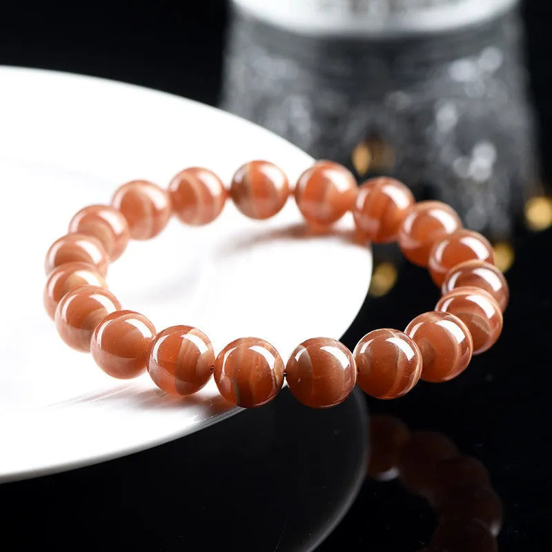 Natural old mine rhodochrosite round beads bracelet from Peru with geometric shape and Ruyi design elements