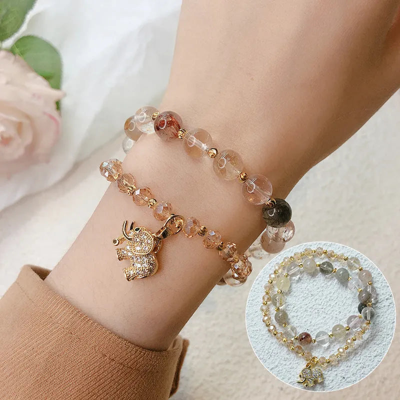 Retro colour hair crystal and strawberry quartz bracelet for women with adjustable ethnic design