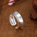 Open ring sterling silver with frosted finish and adjustable opening, geometry ornament