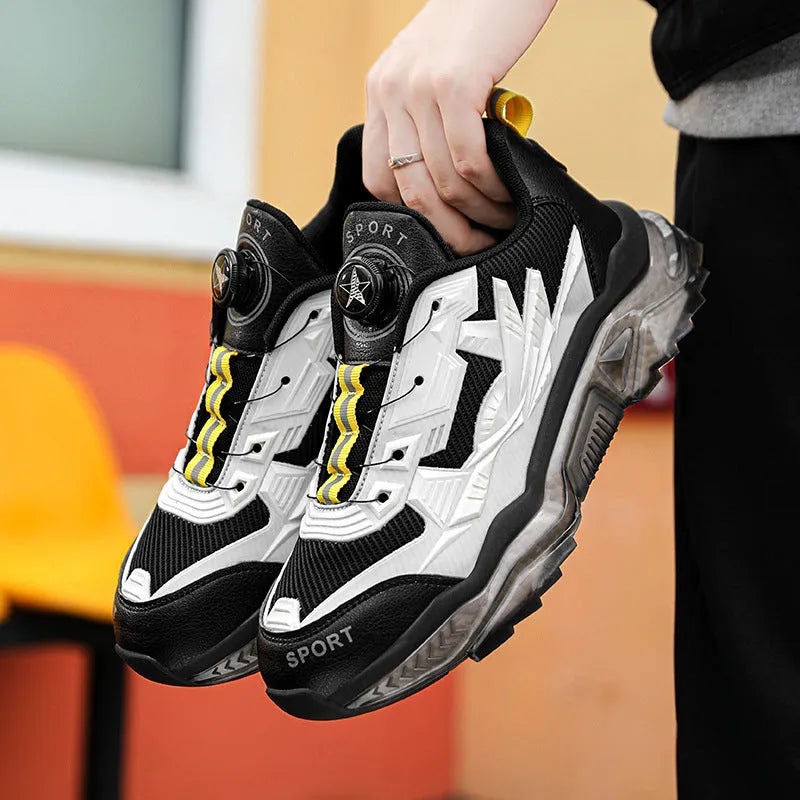 Men's black rotating button platform casual sneakers with mesh upper on a rubber sole.