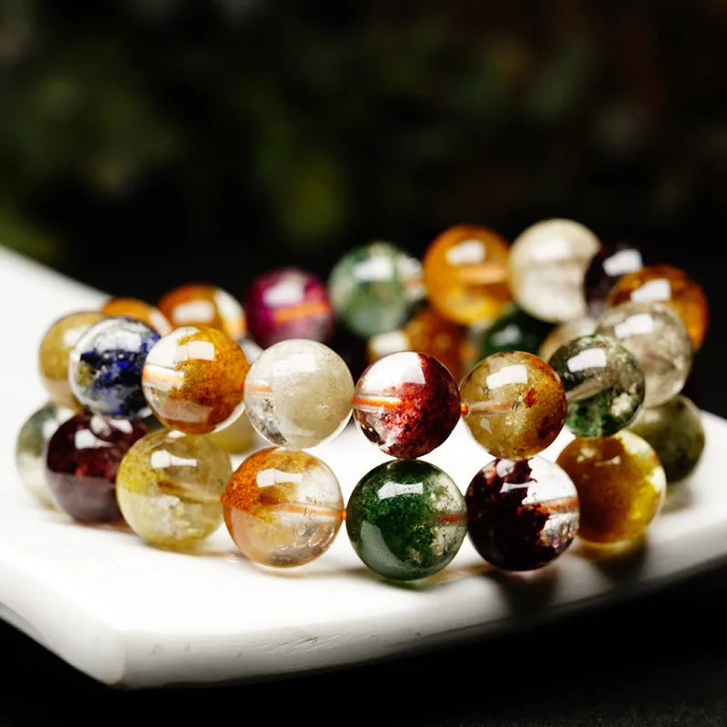 Crystal bracelet with 10mm spherical beads showing ghost cornucopia design in ethnic retro style