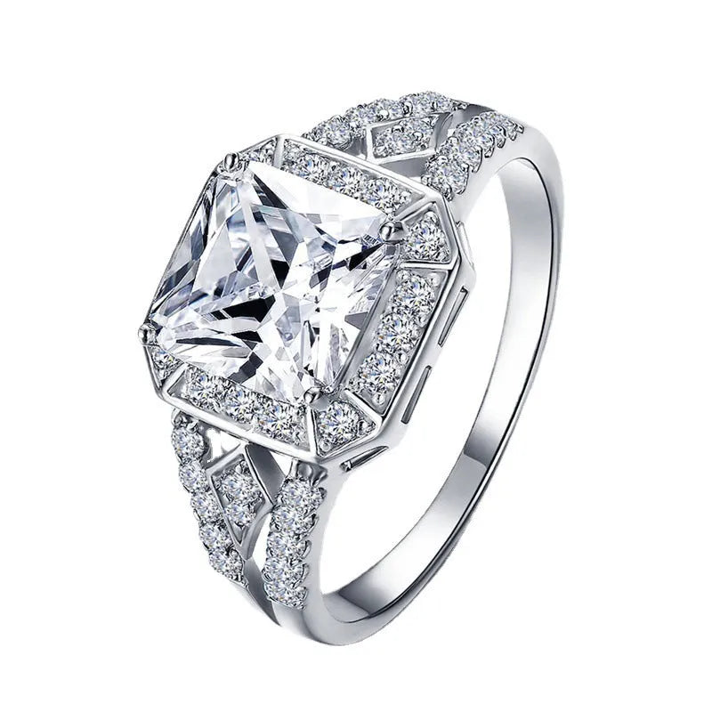 Platinum-colour geometric women's ring with hollow design and zircon inlay