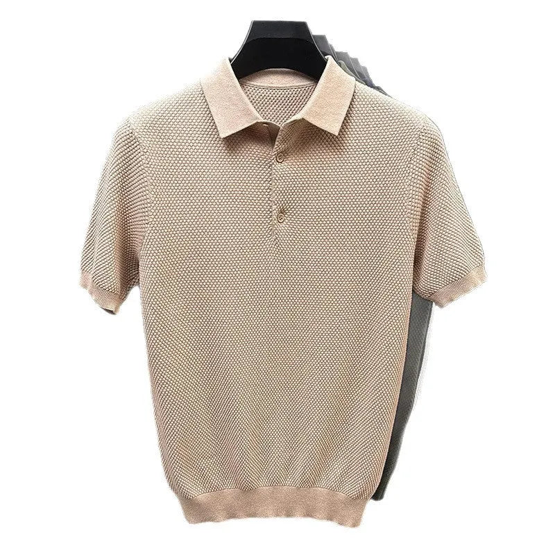 A loose-fitting short sleeve cotton pullover sweater on a hanger, shown in one of the six available colours.