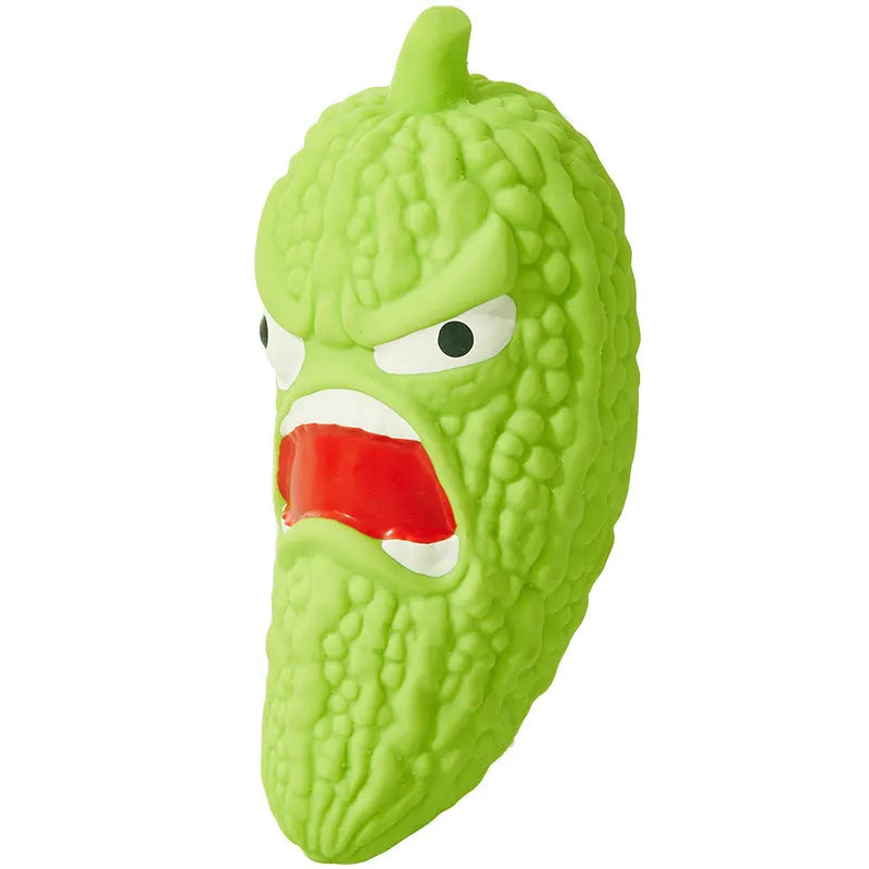 Bitter melon shaped or chili shaped durable plastic dog chew toy with textured surface for teeth cleaning.