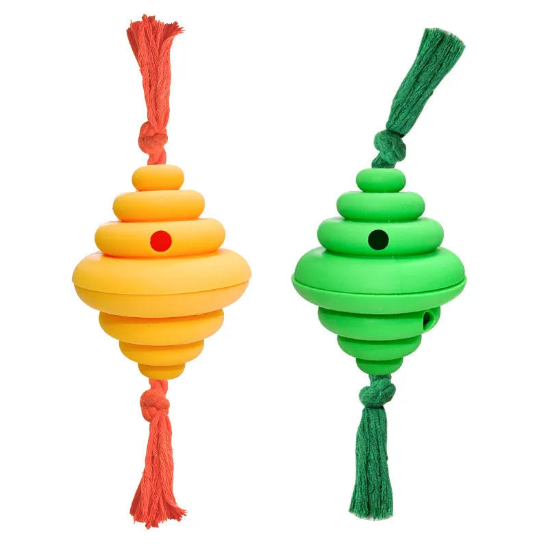 Green and yellow silicone dog ball with knotted rope, a treat-dispensing toy for large dogs.