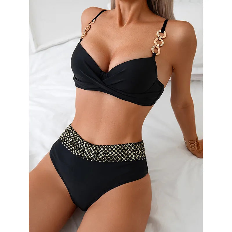 Black two-piece bikini swimsuit with sleeveless top and briefs on a mannequin