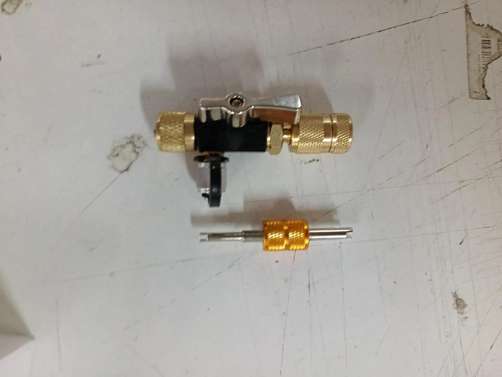 Metal vacuum valve core disassembly tool set showing black and pink styles for 1/4 and 5/16 tyre valves.