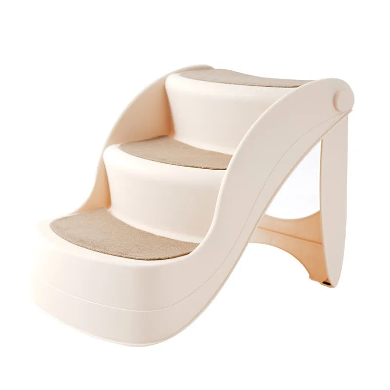 Foldable plastic pet stairs with non-slip surface in beige colour beside a sofa