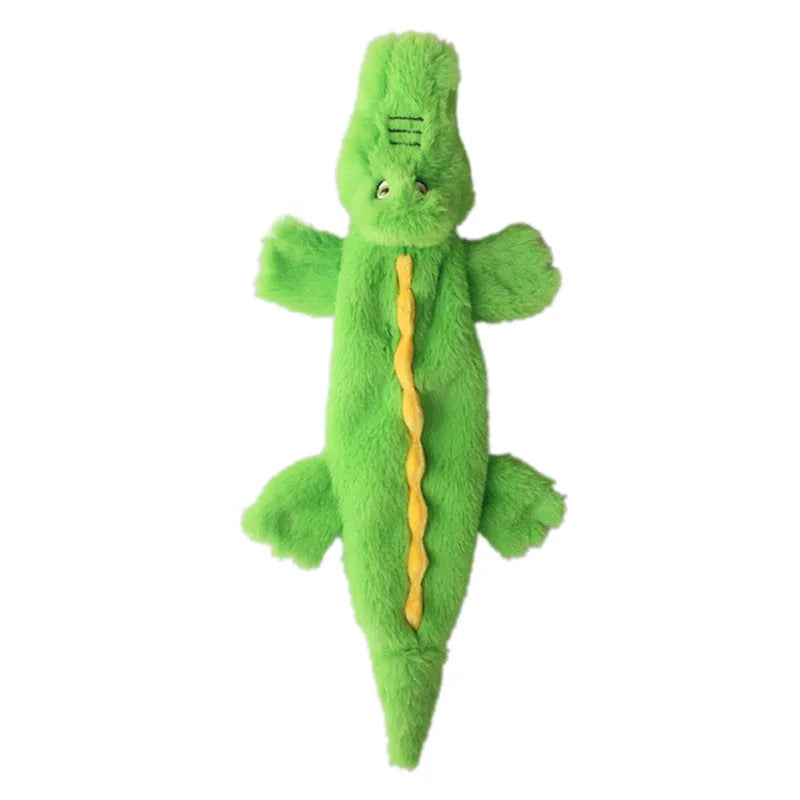 Green crocodile dog toy with no stuffing, squeaker in head and crinkle paper in tail