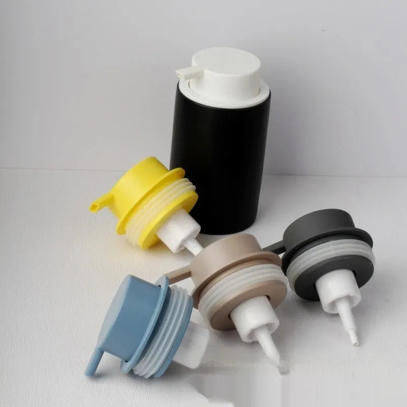 ABS plastic foam pump head in Matte Black and Bright Gold for liquid soap dispensing