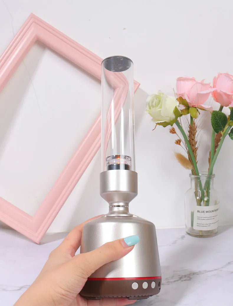 White silver cylindrical Bluetooth speaker night light with ambient glow, 90mm diameter