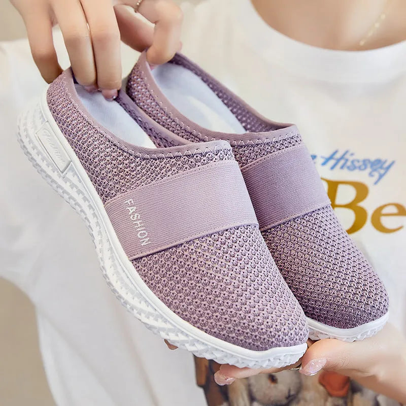 Women's breathable mesh casual shoes with flat heel and round toe in black, grey, pink, or purple