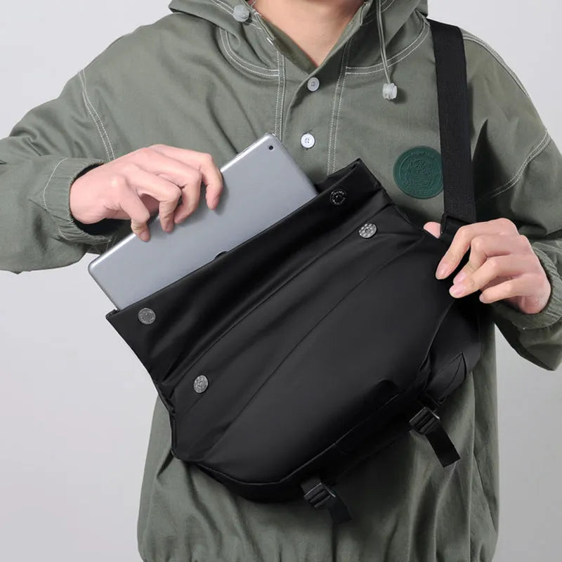 Men's black PU leather crossbody sling backpack with shoulder strap and zipper opening