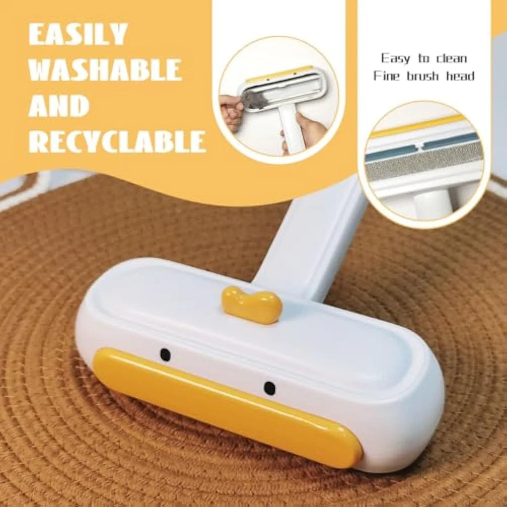 White portable pet hair remover with yellow duck design and polyester bristles for cleaning furniture
