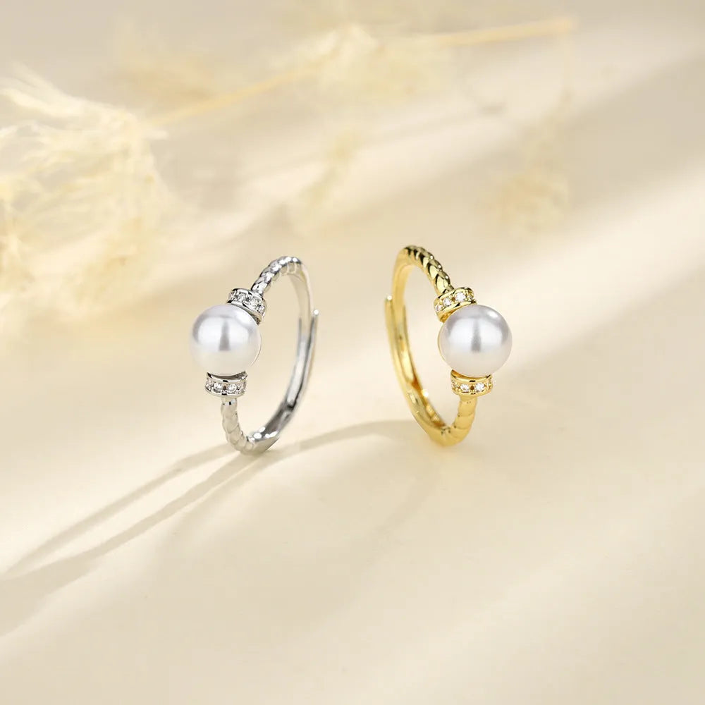 Adjustable copper antique twist pearl ring with geometric design in gold and silver finishes
