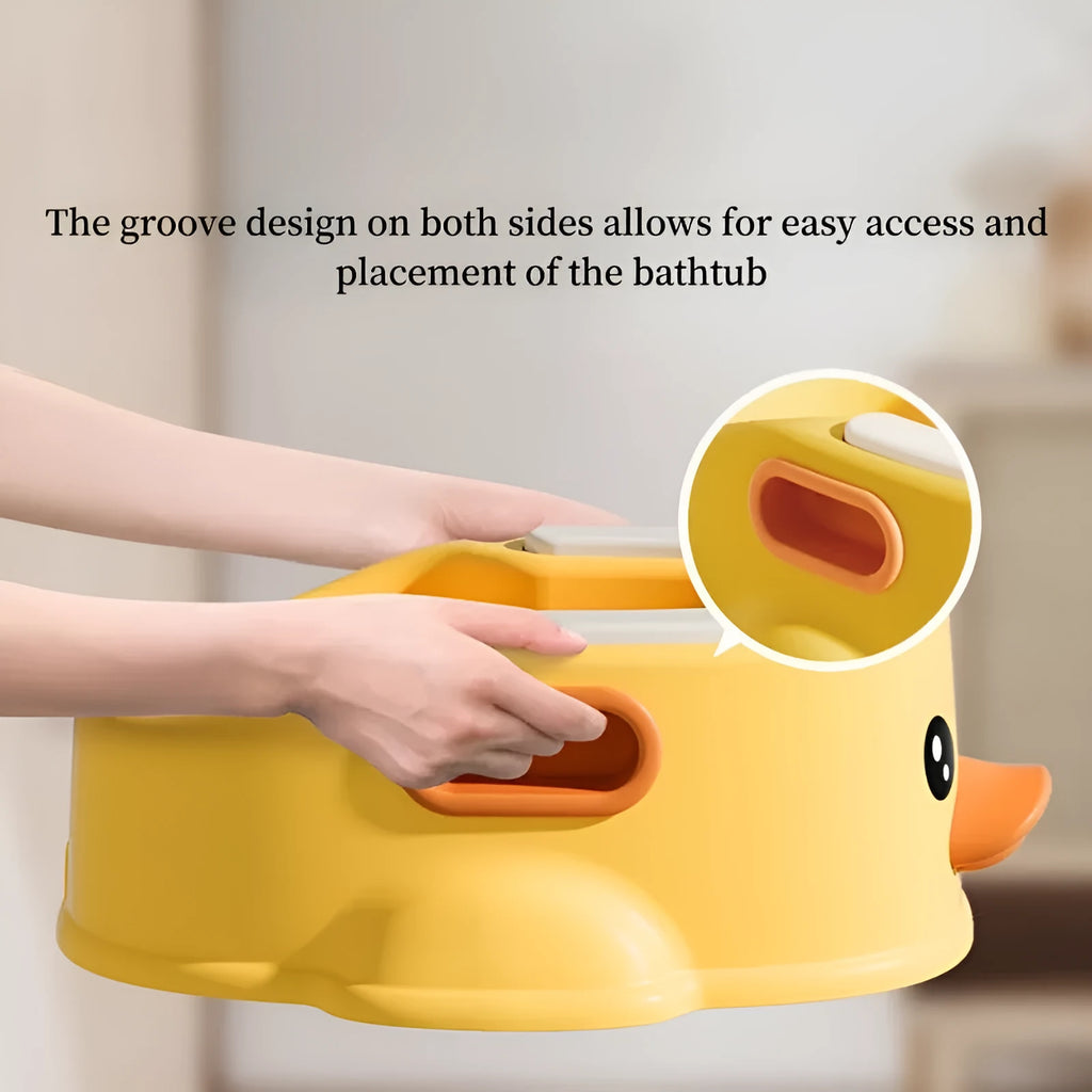 Blue PVC duck-shaped bathtub for washing dogs and cats on grass