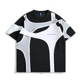 Black loose fit T-shirt with double stitching on padded shoulder strap, round neck collar, and short sleeves