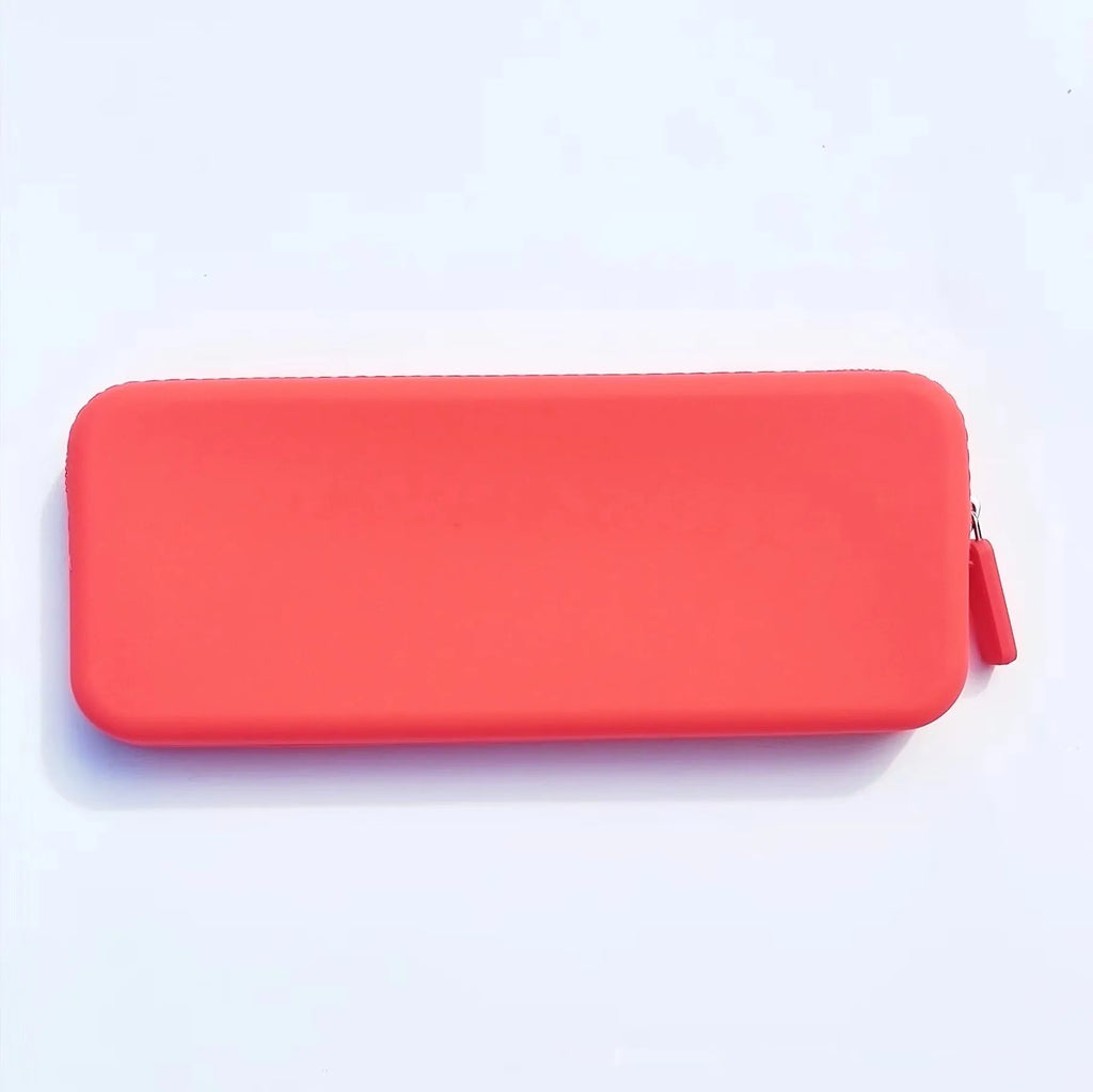 Slim black silicone makeup brush storage bag with zipper, shown next to makeup brushes.