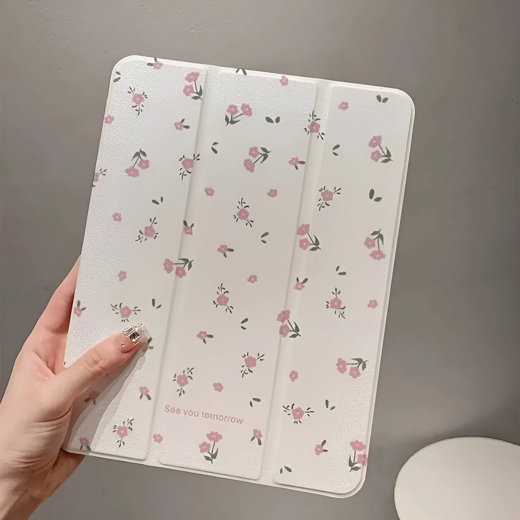 Transparent tri-fold iPad case with floral pattern showing built-in stand angle.