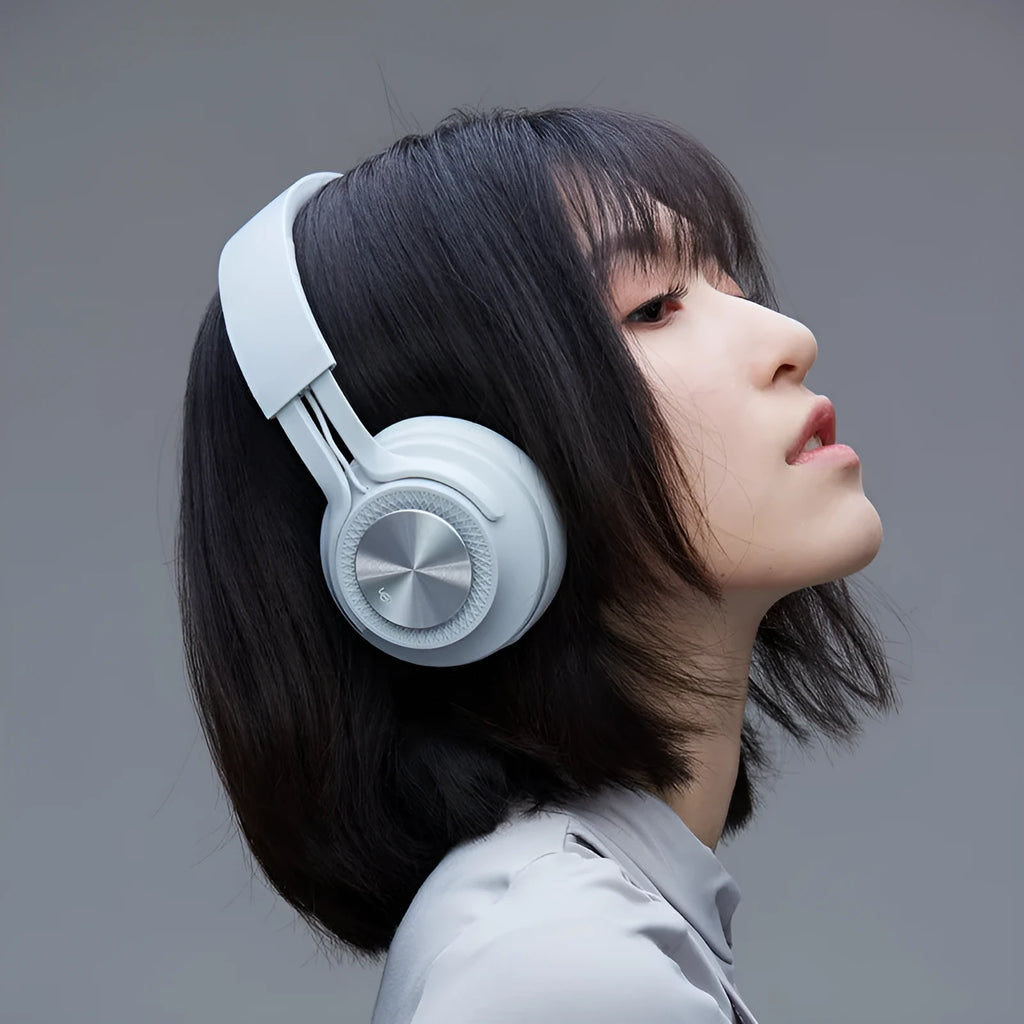 Wireless Bluetooth sports headset in black, green, grey, or red colours with over-ear design.