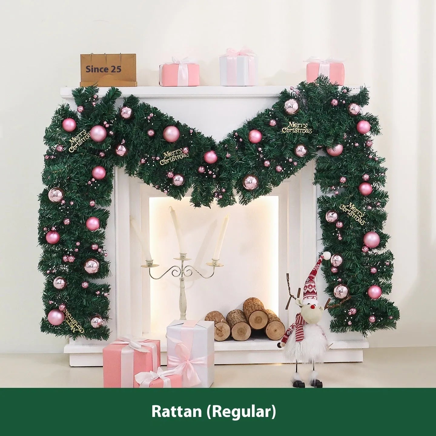 Long pink small fruit rattan Christmas garland draped over a stair bannister with optional LED lights
