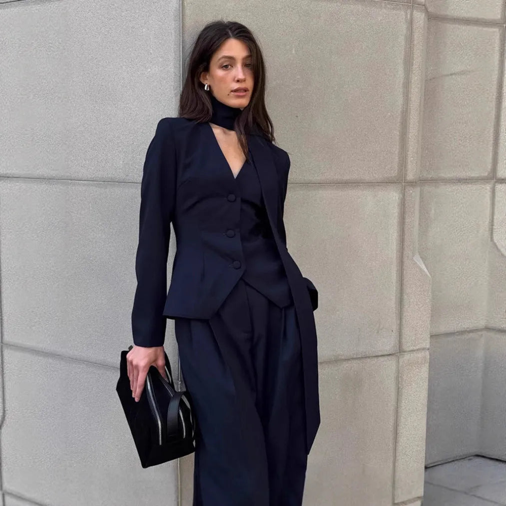 Women's navy blue halter suit set with polyester top and full-length trousers in sizes S M L