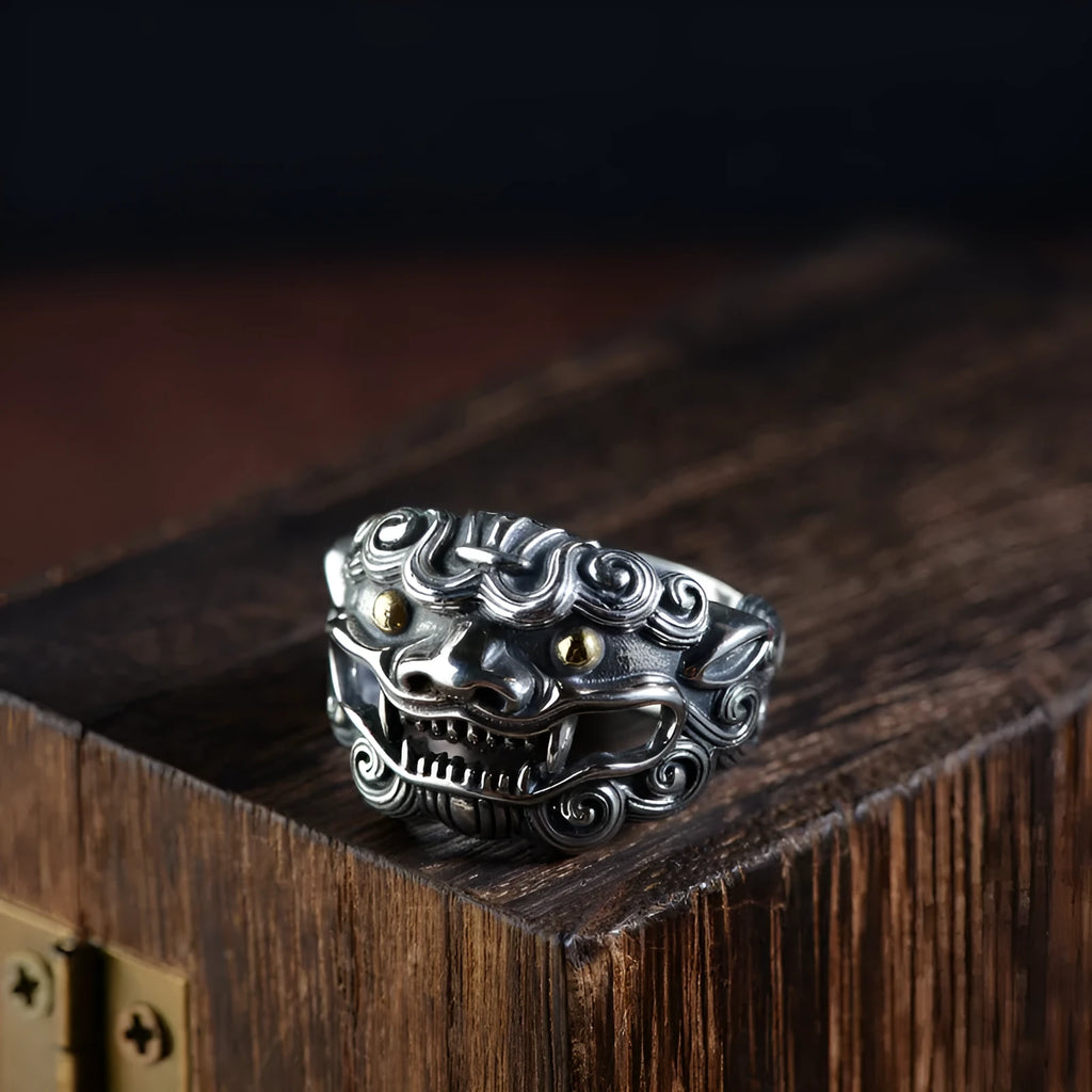 Sterling silver open ring showing animal or zodiac pattern detail with adjustable design