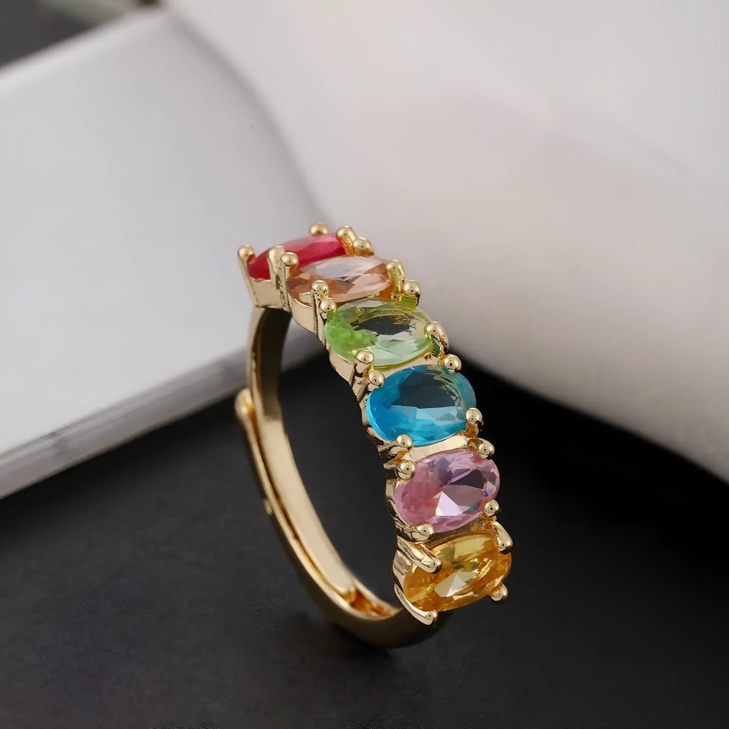 Gold-colour adjustable copper ring with a zircon stone in a simple retro style.