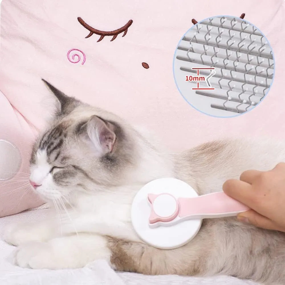 Blue self-cleaning pet brush with rubber handle and metal pins for removing loose cat and dog hair.