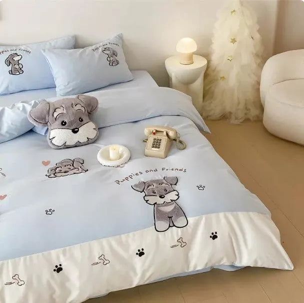 Cute Schnauzer cartoon embroidered bedding set with quilt cover, sheet, and pillowcases on bed